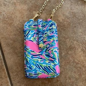 Lilly Pulitzer wallet with phone compartment.